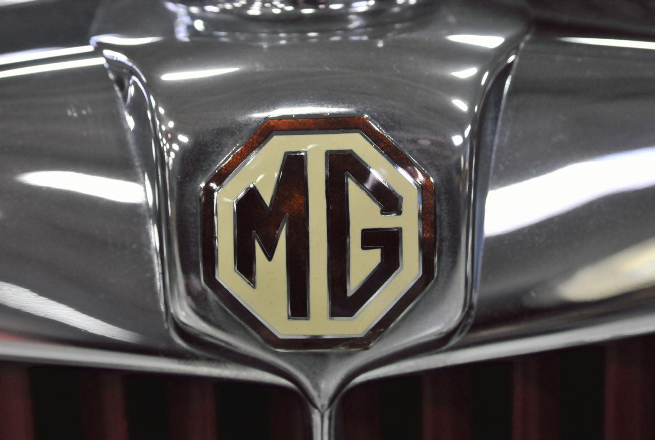 логотип бренда MG